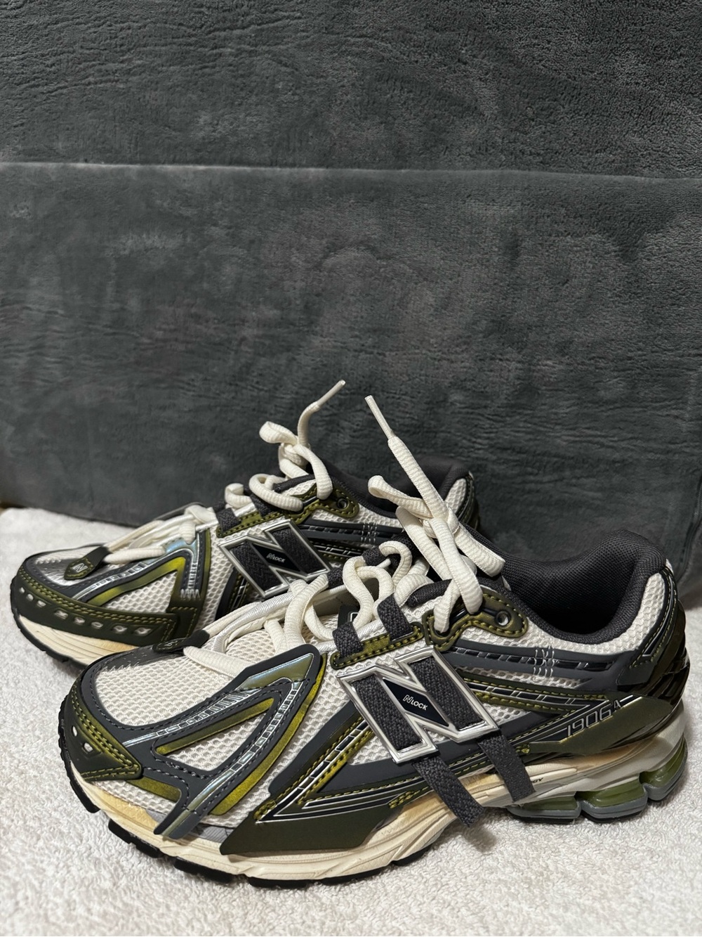 New Balance Olive Green, Black & White Men's size 5.5 or 7 Women’s.Sneakers